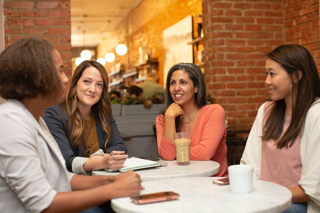 group of diverse people talking