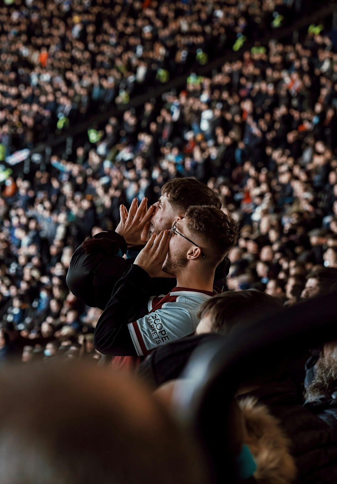 individuals in large audience