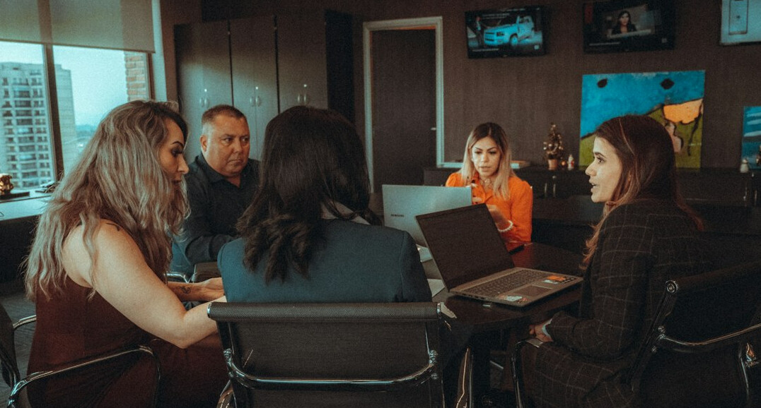 group of people in discussion