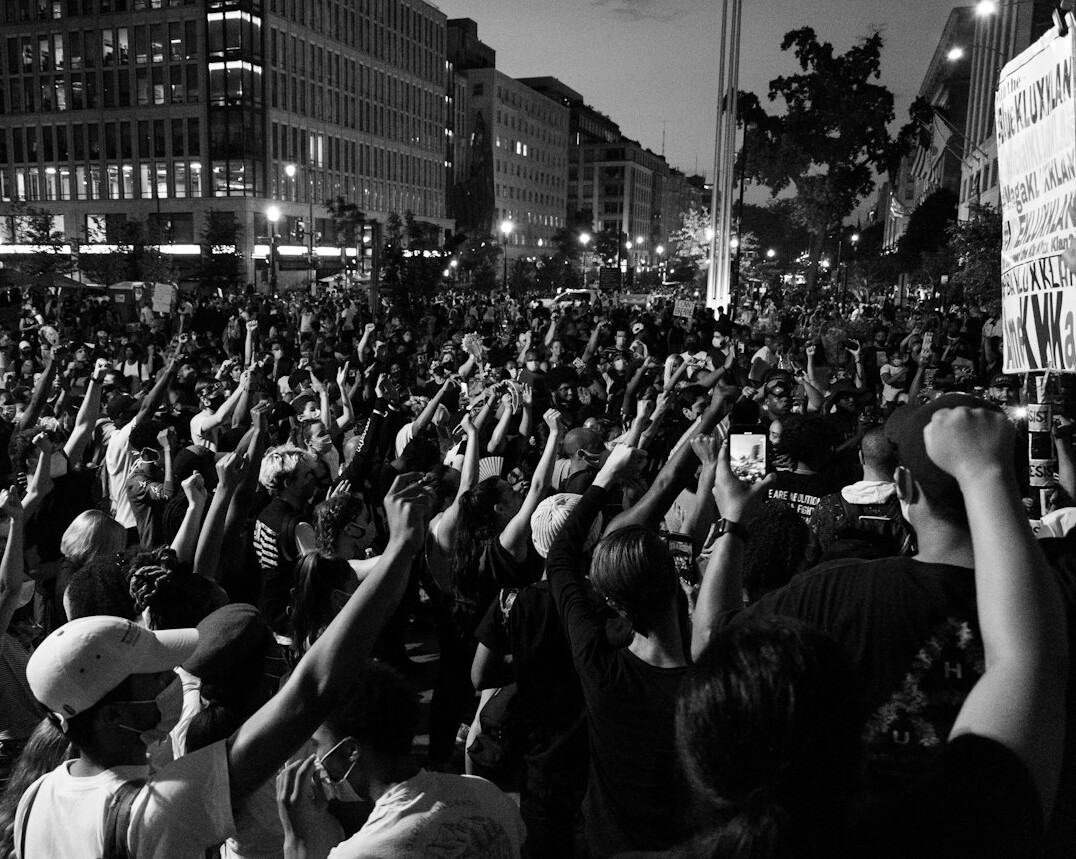 crowd protesting with phones